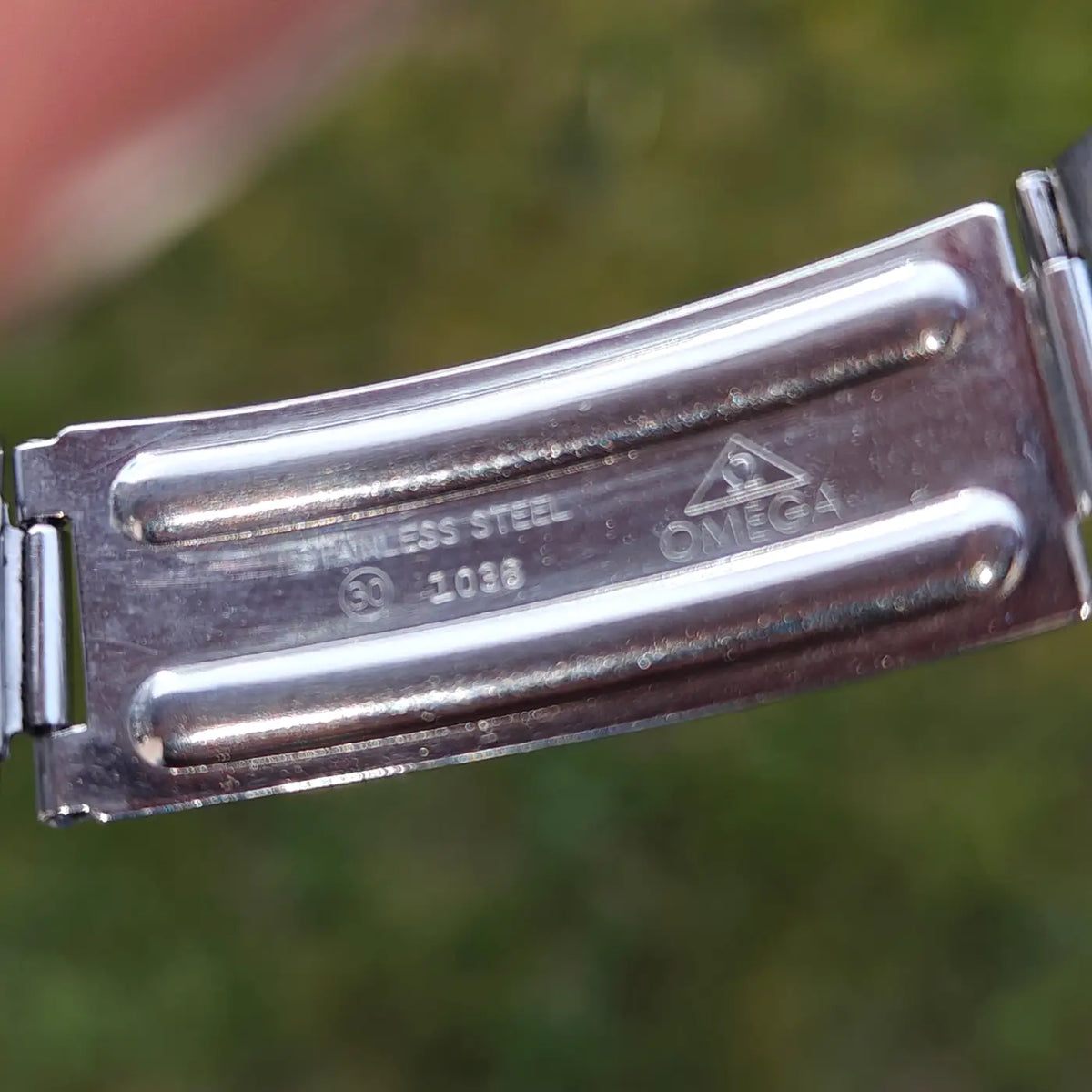 Omega Genève komplett aus Edelstahl, Original 166.070 — Archivfoto 12/12
