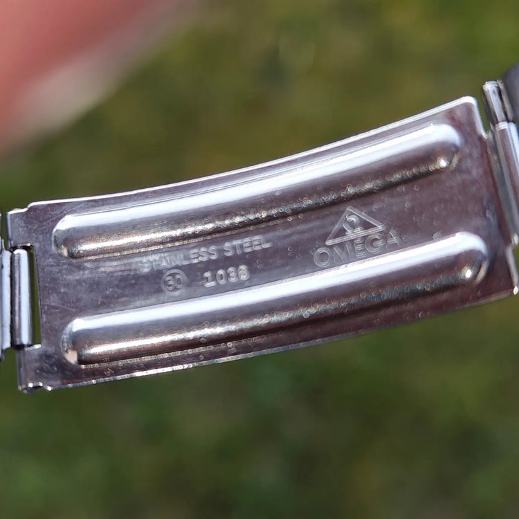 Omega Genève komplett aus Edelstahl, Original 166.070 — Archivfoto 12/12