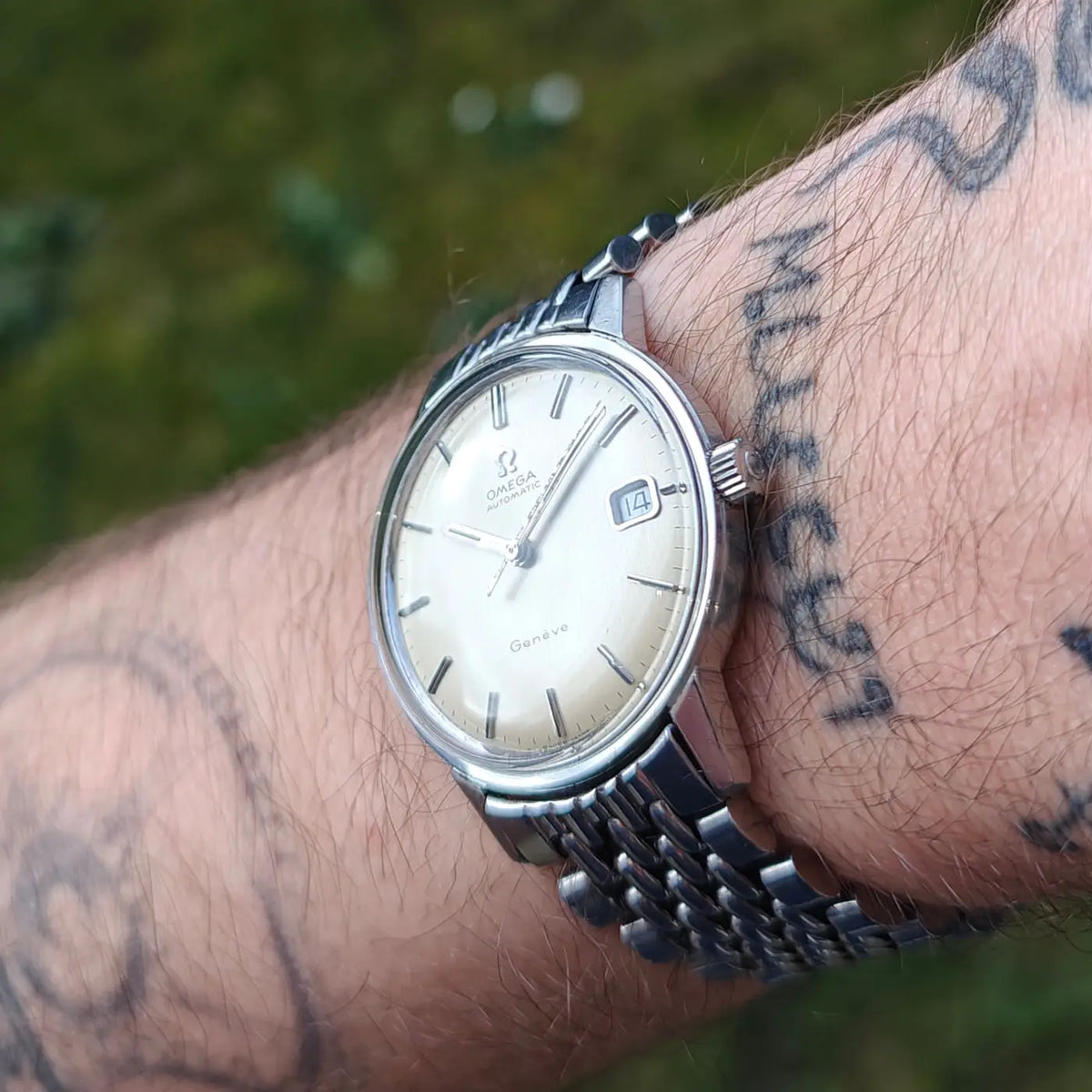 Omega Genève komplett aus Edelstahl, Original 166.070 — Archivfoto 7/12