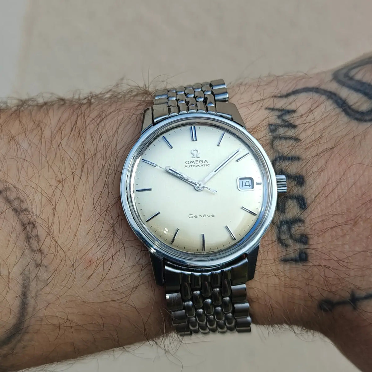 Omega Genève komplett aus Edelstahl, Original 166.070 — Archivfoto 2/12