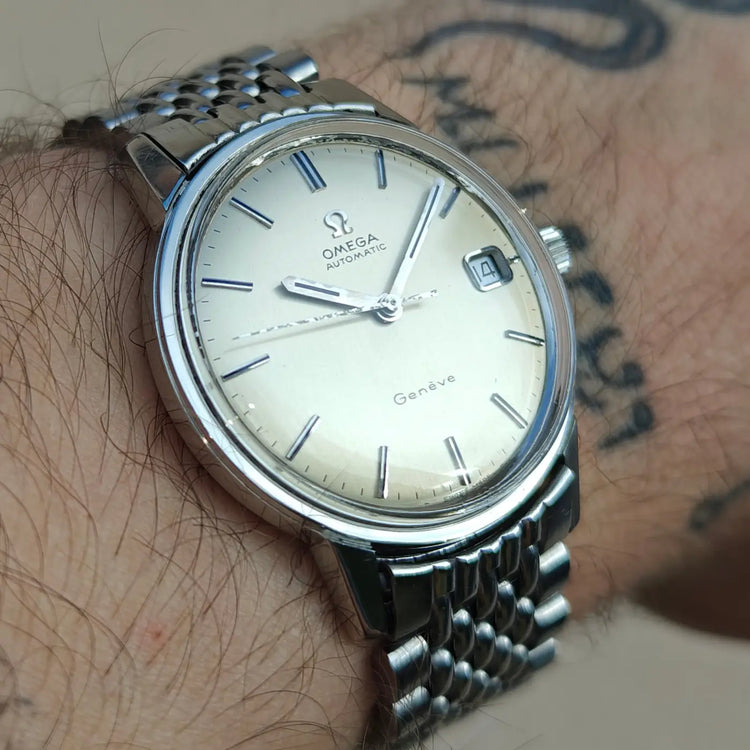Omega Genève komplett aus Edelstahl, Original 166.070 — Archivfoto 1/12