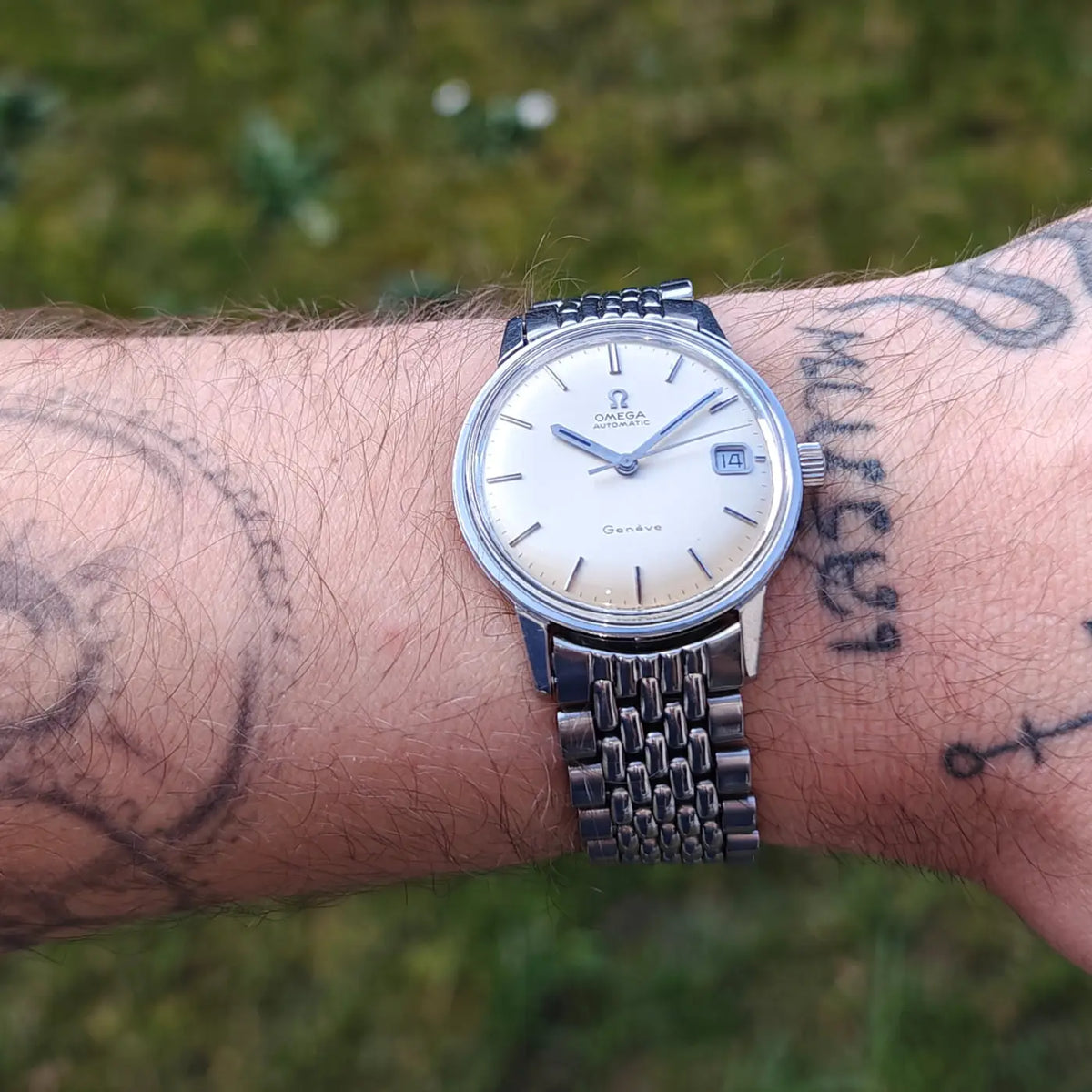 Omega Genève komplett aus Edelstahl, Original 166.070 — Archivfoto 8/12