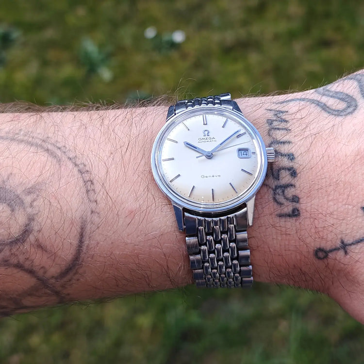 Omega Genève komplett aus Edelstahl, Original 166.070 — Archivfoto 8/12