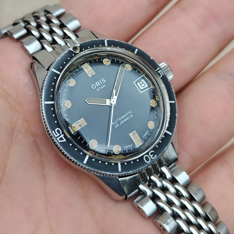Oris Star Skin Diver Vintage-Automatikuhr mit dunklem Zifferblatt und Stahlarmband