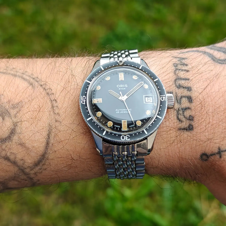 Oris Star Skin Diver Vintage-Automatikuhr mit Stahlarmband und dunklem Zifferblatt