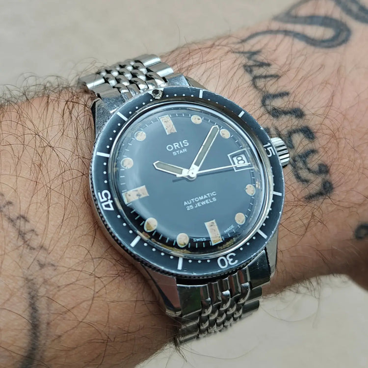 Oris Star Skin Diver Taucheruhr aus Stahl mit dunklem Zifferblatt und schwarzer Lünette